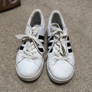White Sneakers with Black Stripes